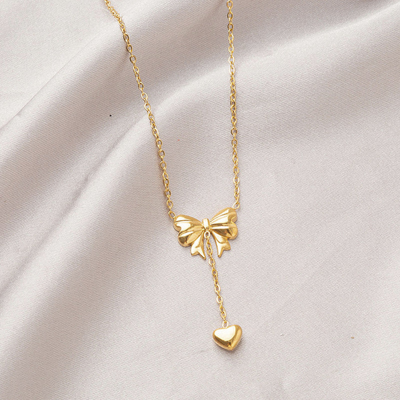 Gold Plated Stainless Steel Anti Tarnish Heart Themed Bow inspired Pendant Necklace