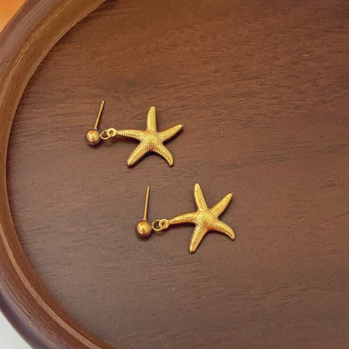 Gold Plated Star Themed Drop Earrings